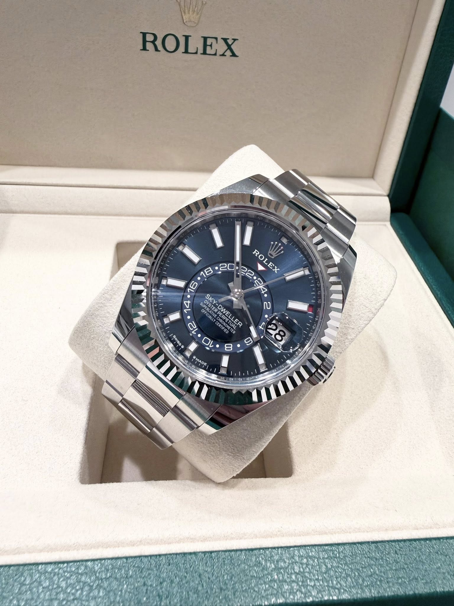 May be an image of wrist watch and text