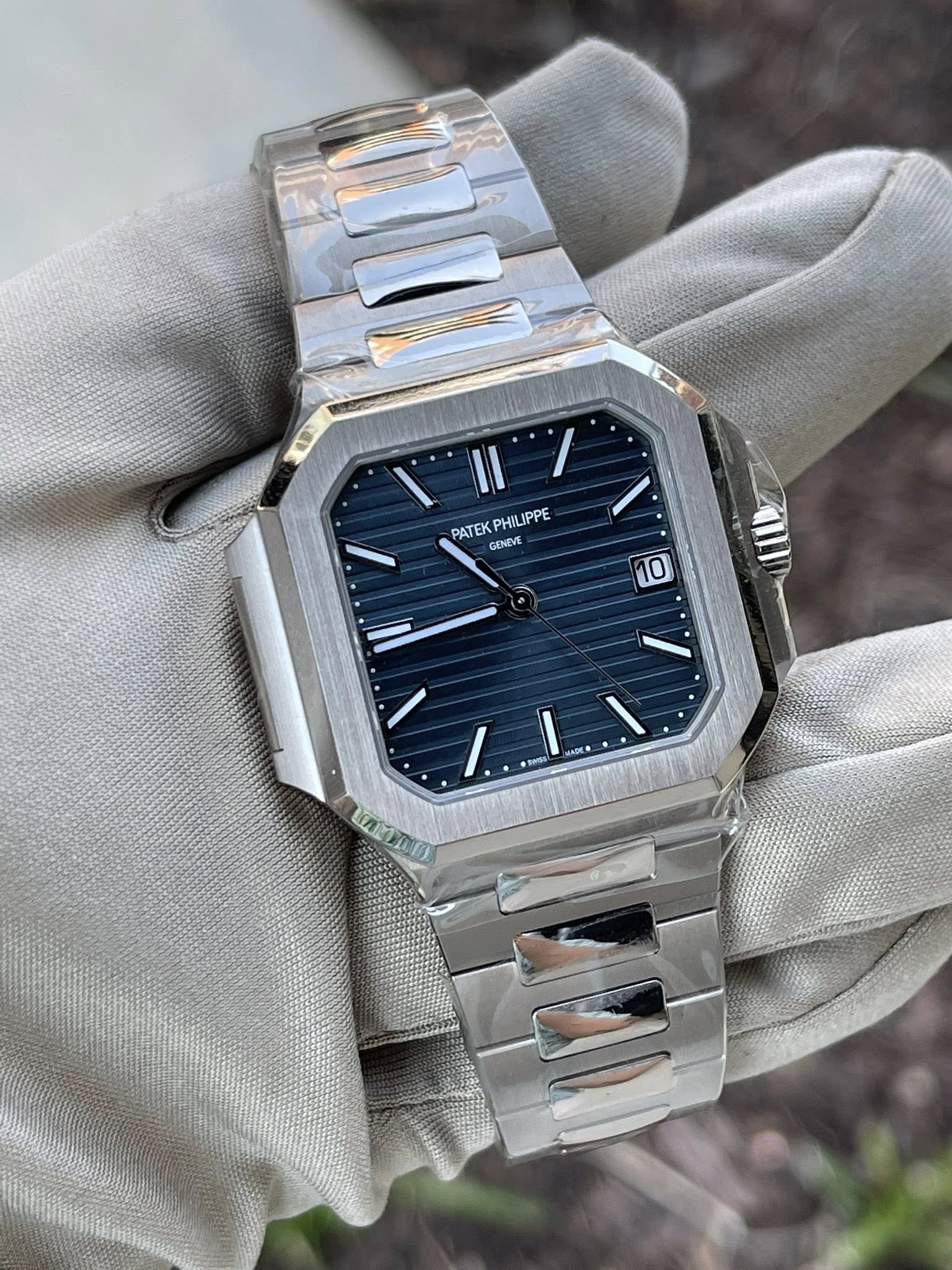May be an image of wrist watch and text
