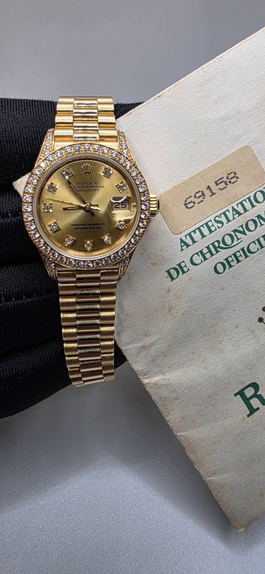 May be an image of wrist watch and text