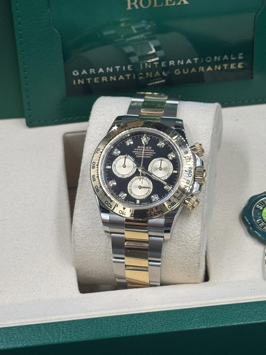 May be an image of wrist watch and text