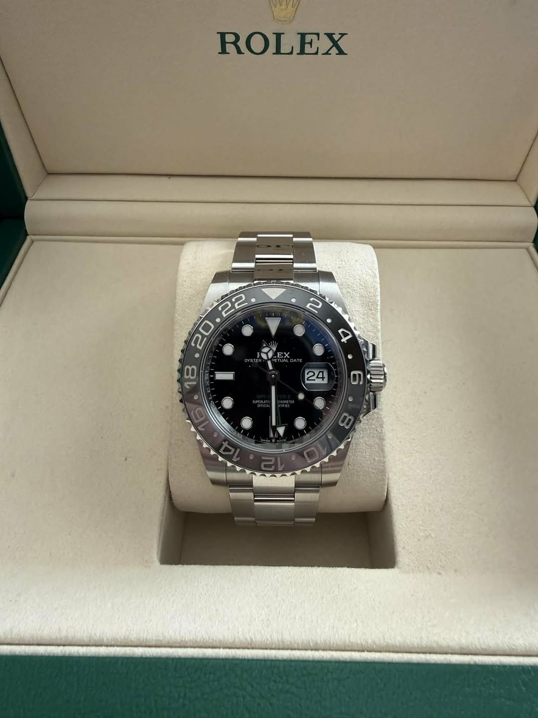 May be an image of wrist watch and text