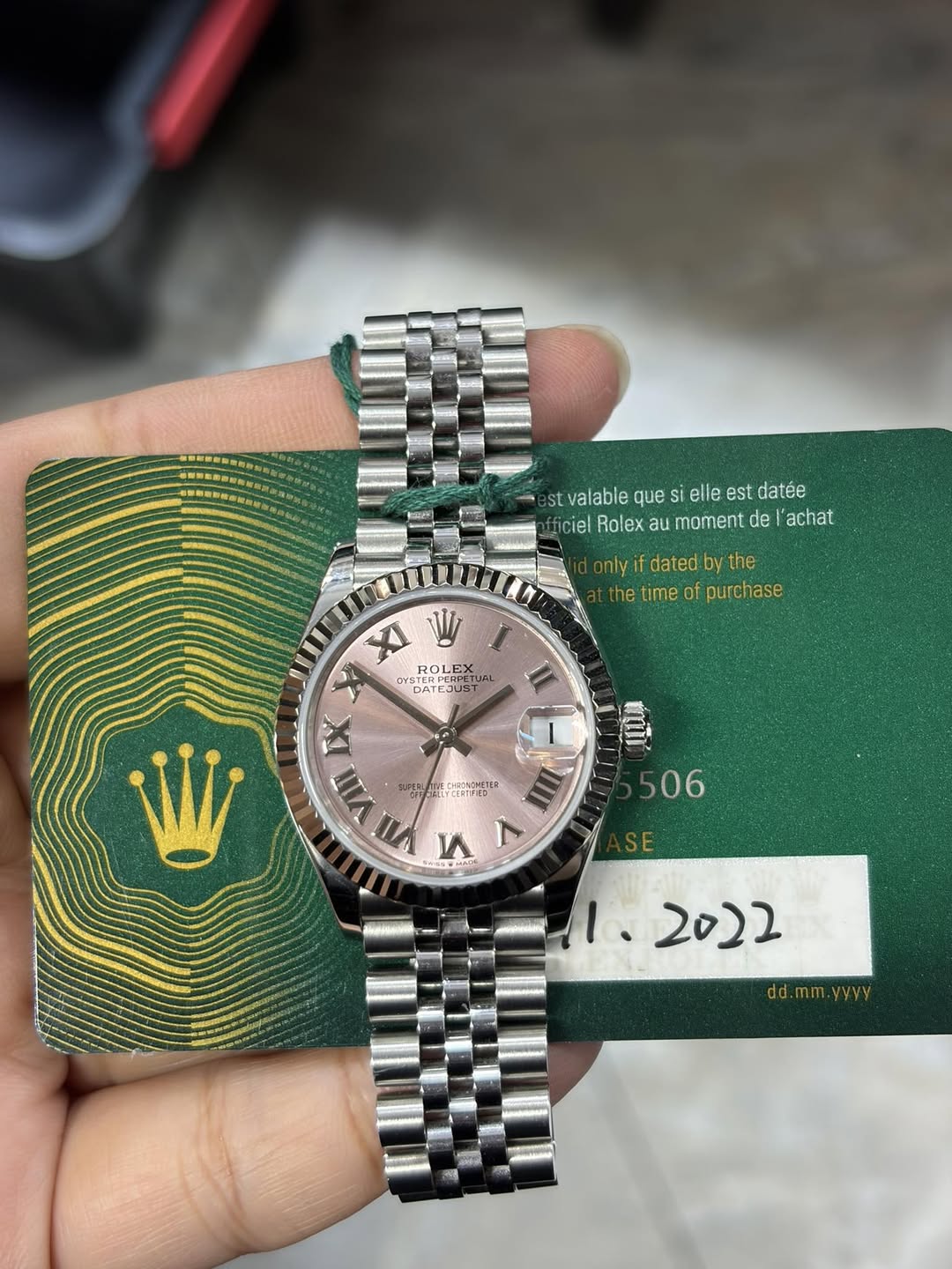 May be an image of wrist watch and text that says 'st valable que stvalablequesiellestdatee si elle est datée ficiel iel Rolex au moment de l'achat nly if dated by the he time of…
