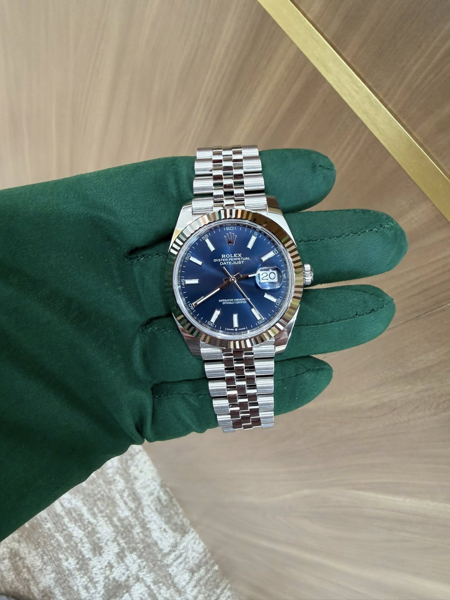 May be an image of wrist watch and text
