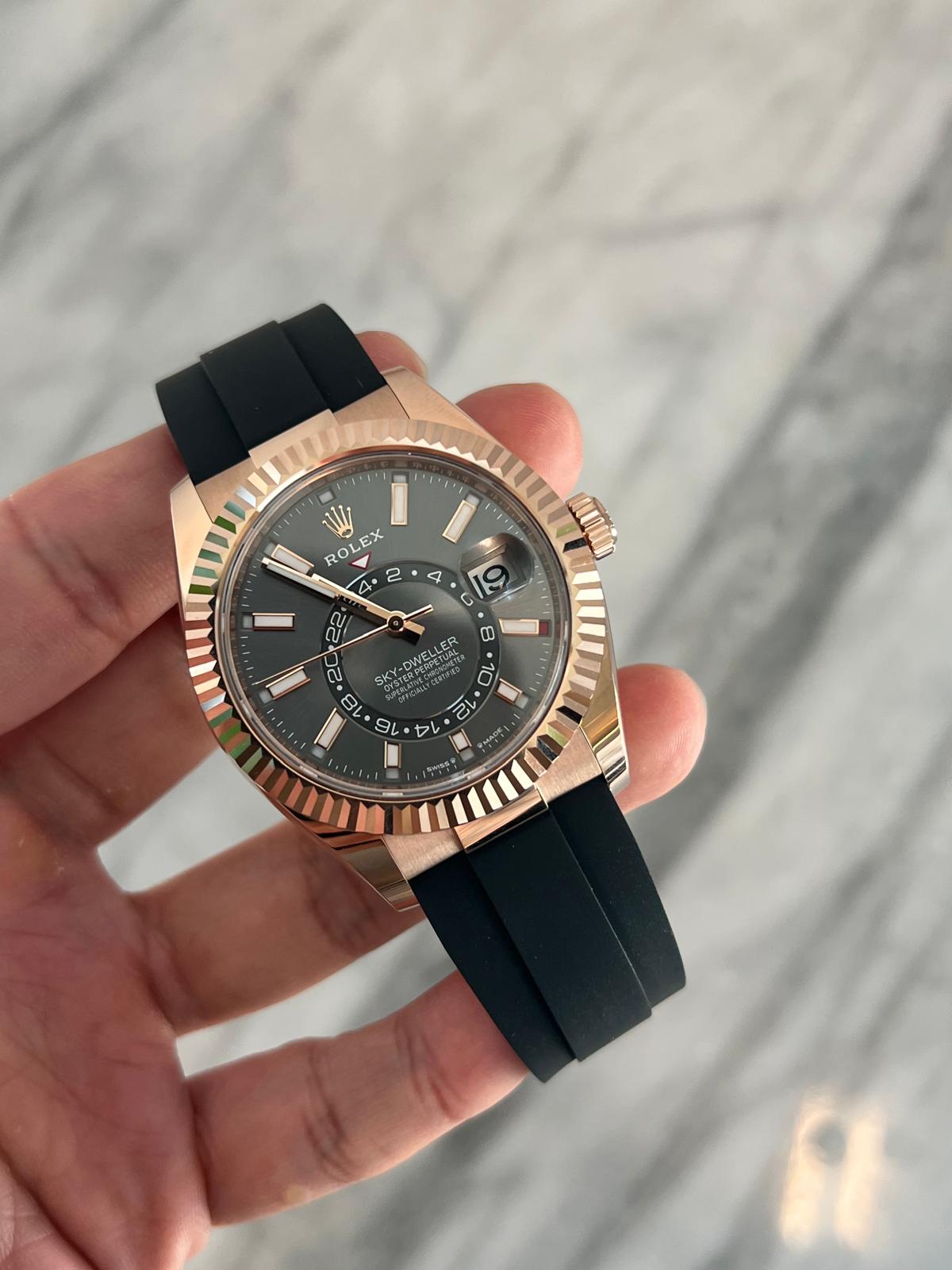 May be an image of wrist watch and text