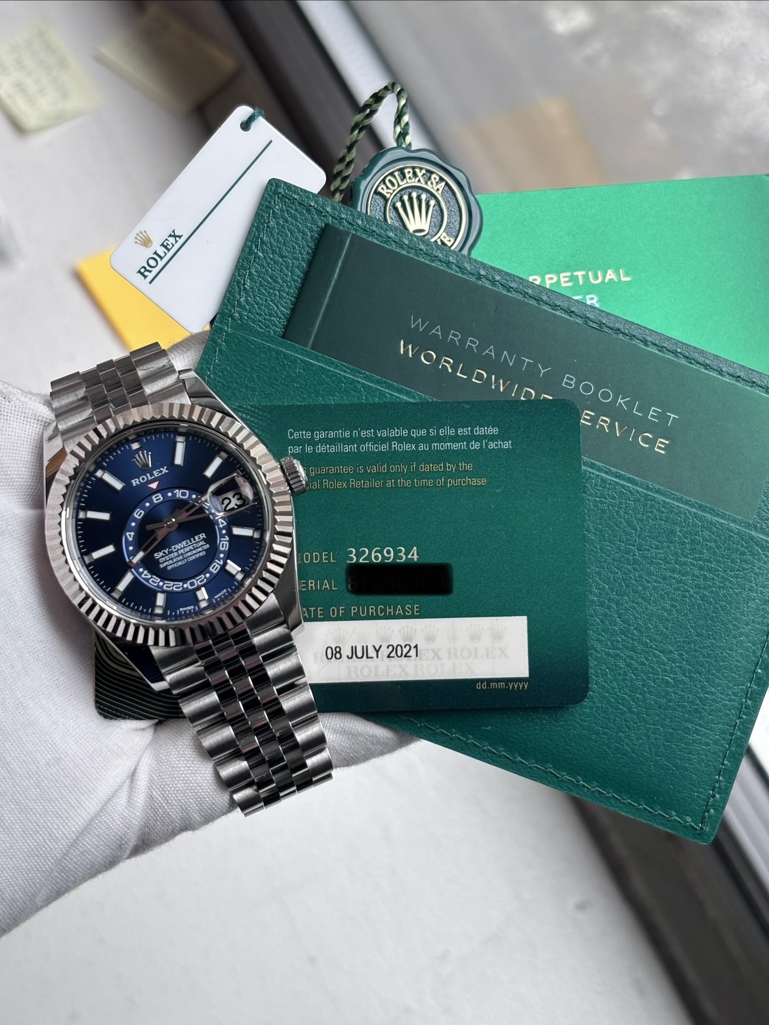 May be an image of wrist watch and text