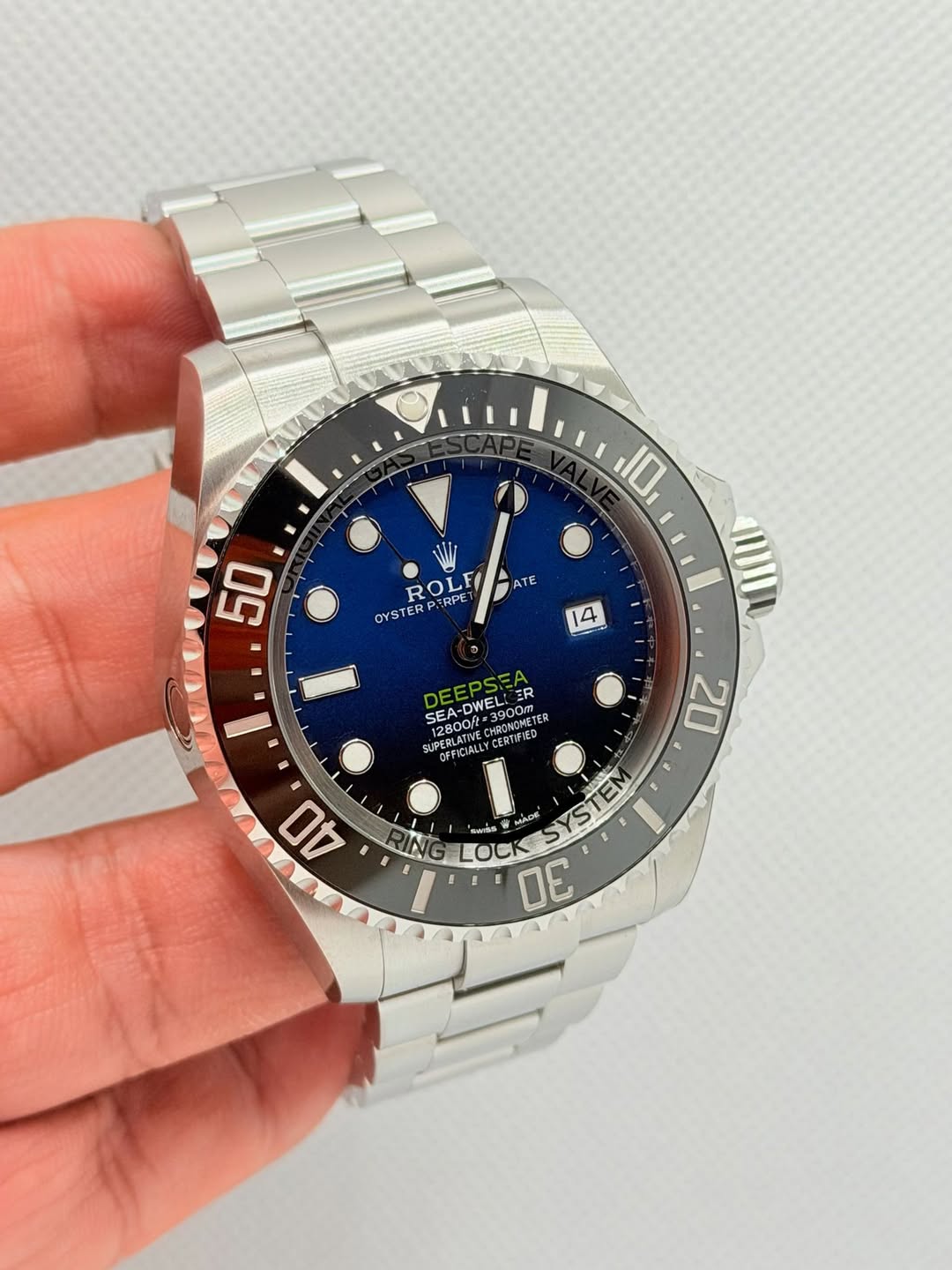 May be an image of wrist watch and text