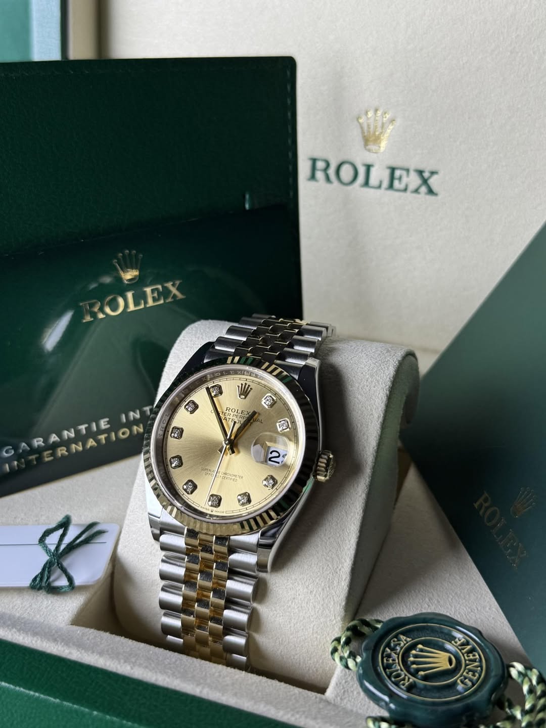 May be an image of wrist watch and text