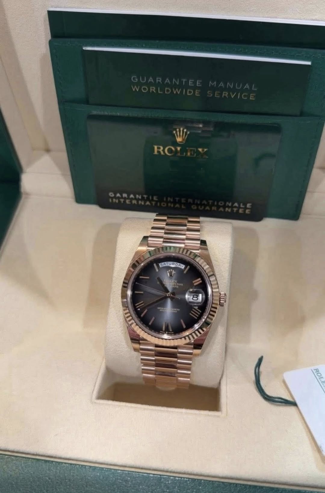 May be an image of wrist watch and text