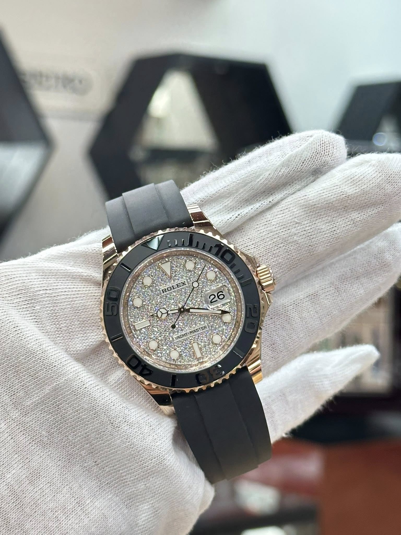 May be an image of wrist watch and text that says 'ROLEX 1I00 26'