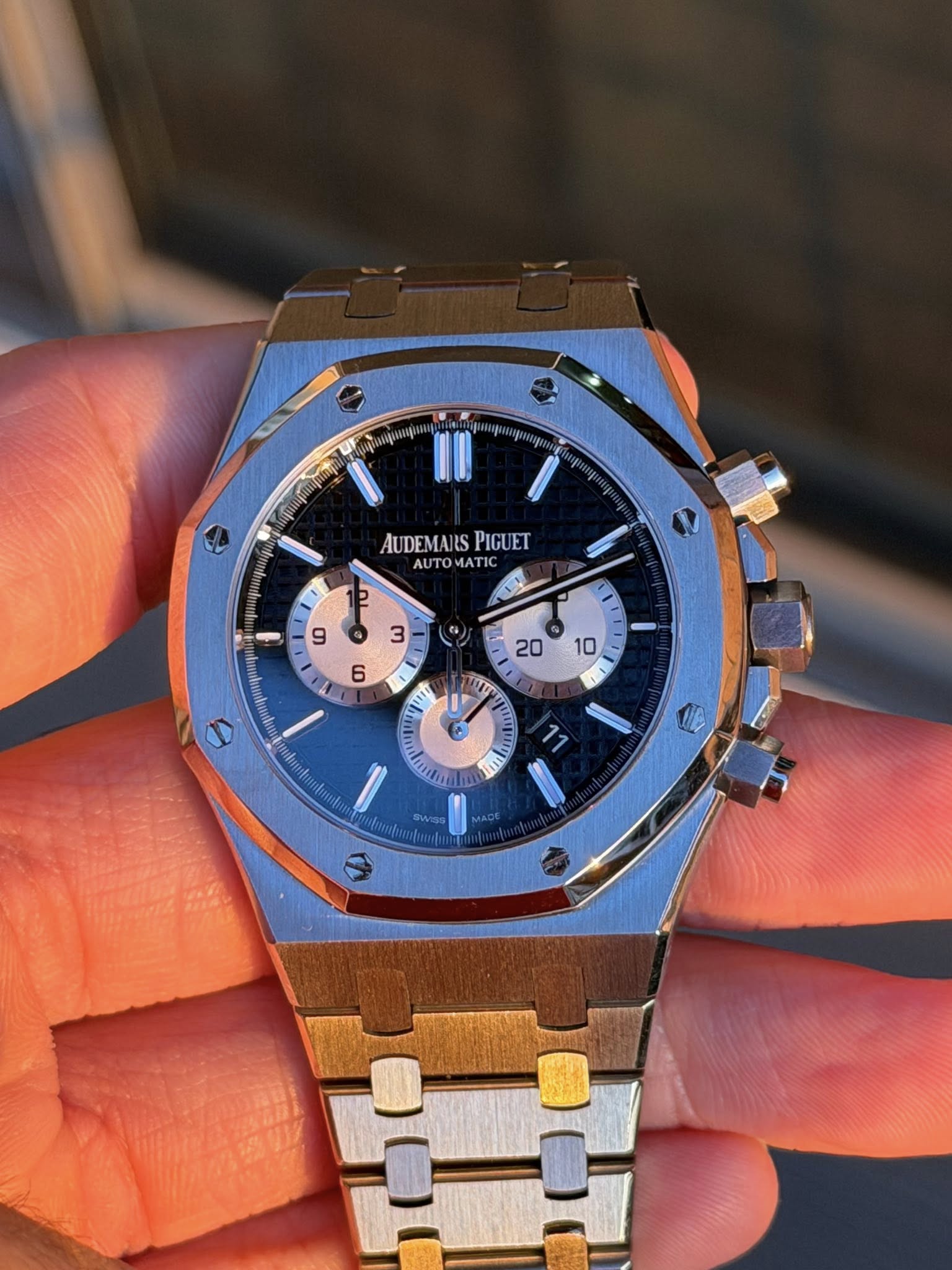 May be an image of wrist watch and text