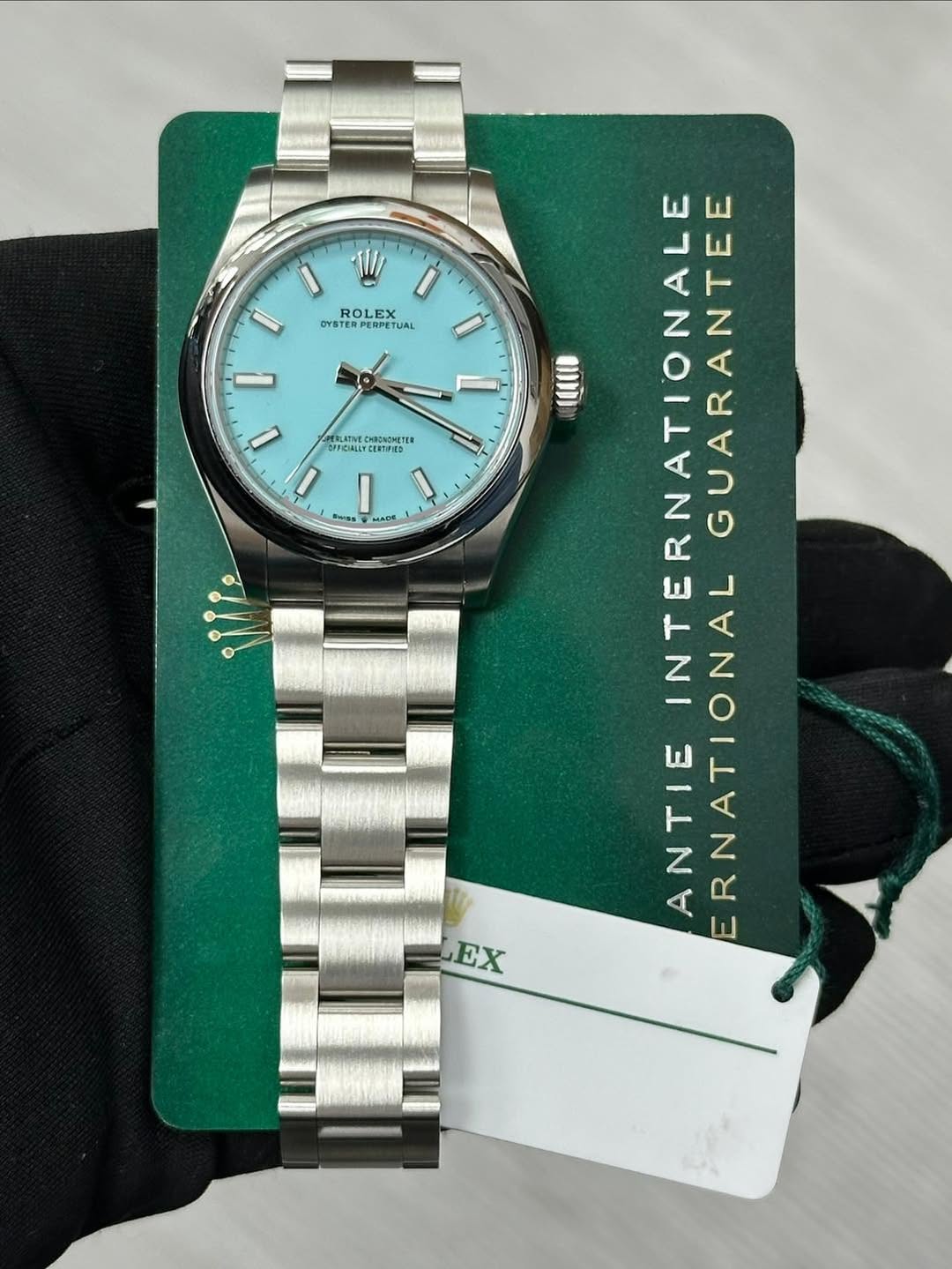 May be an image of wrist watch and text