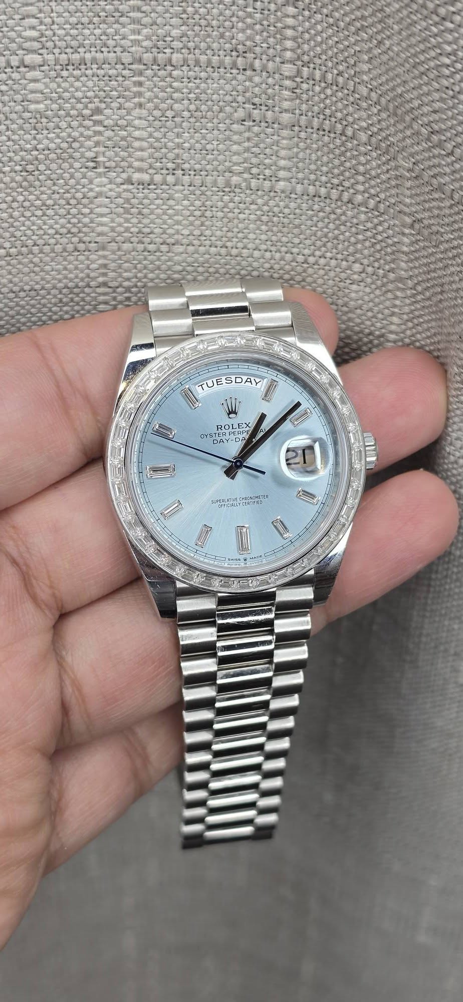 May be an image of wrist watch and text