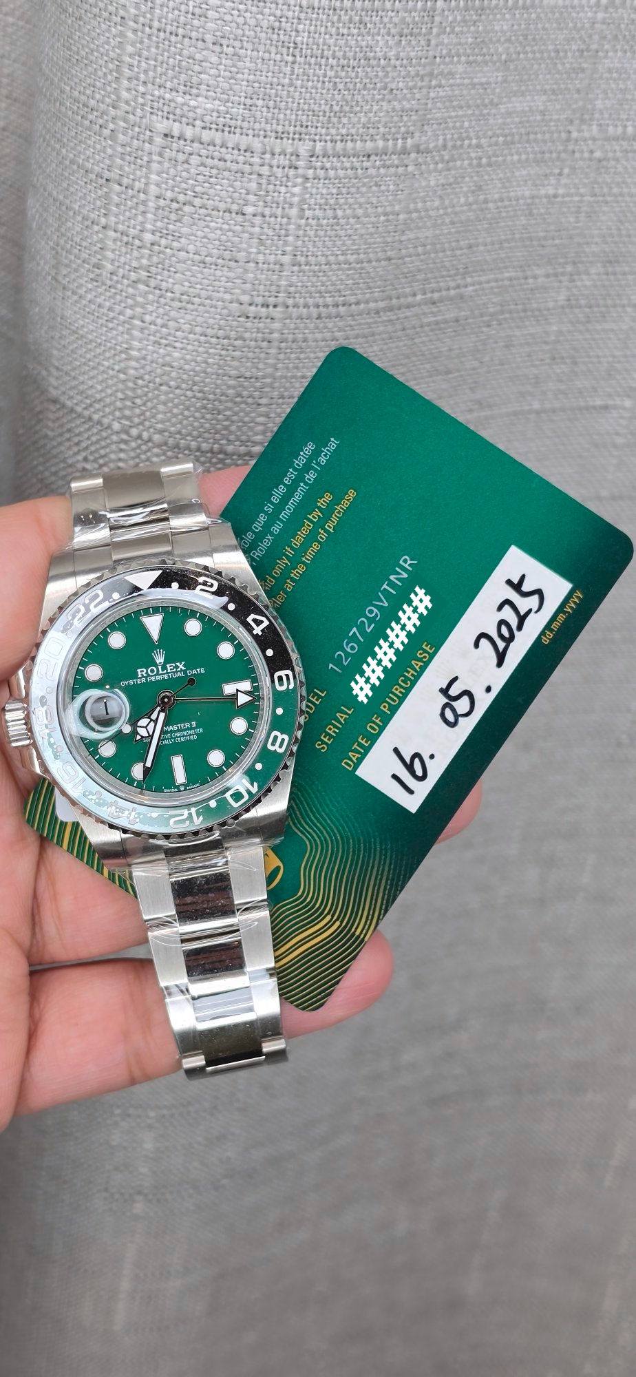 May be an image of wrist watch and text