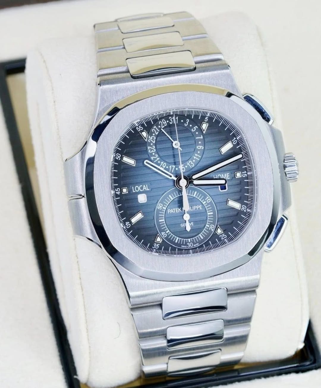 May be an image of wrist watch and text