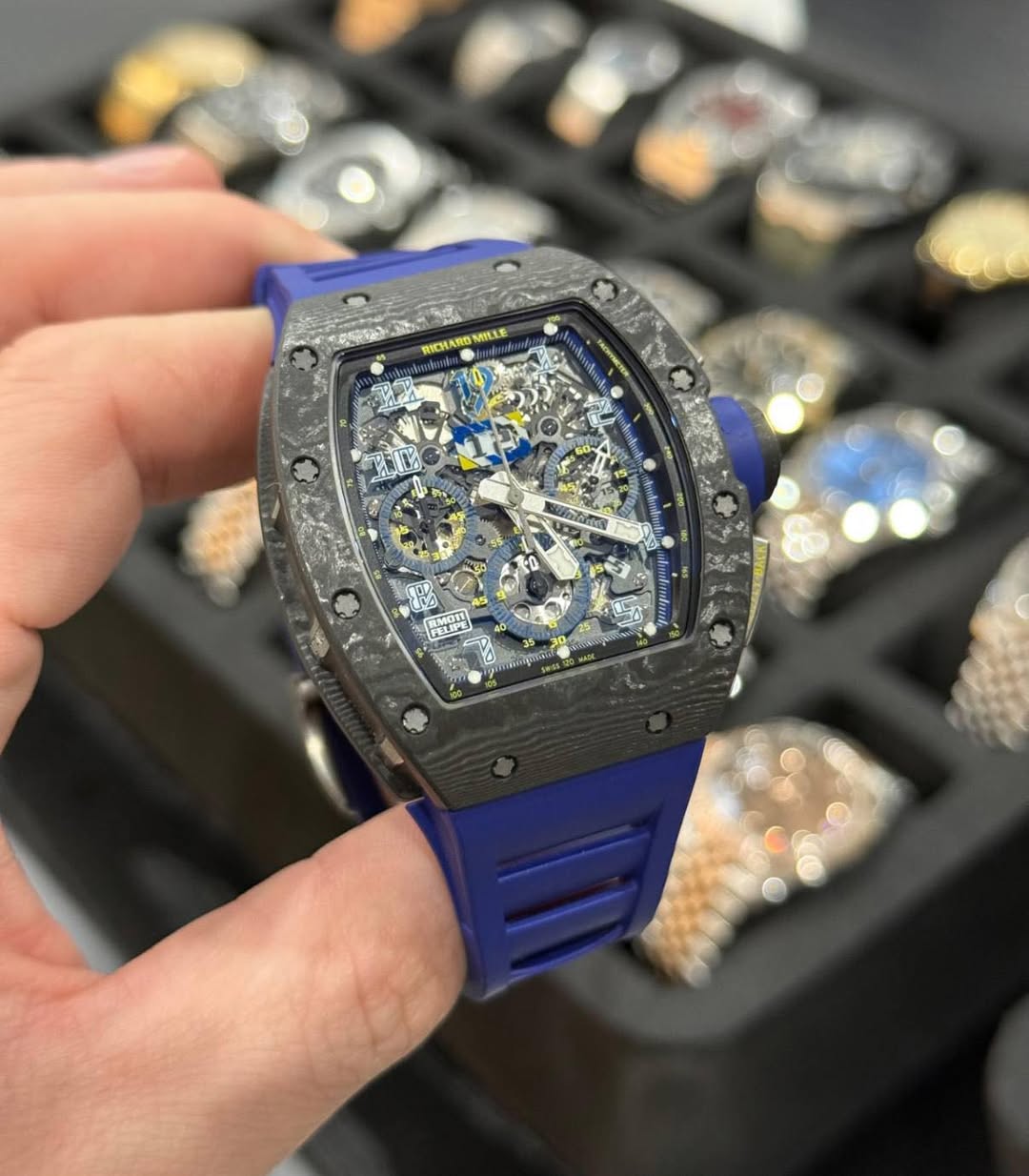 May be an image of wrist watch and text