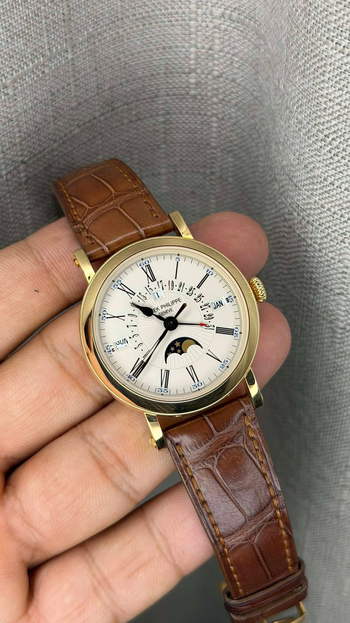 May be an image of wrist watch and text
