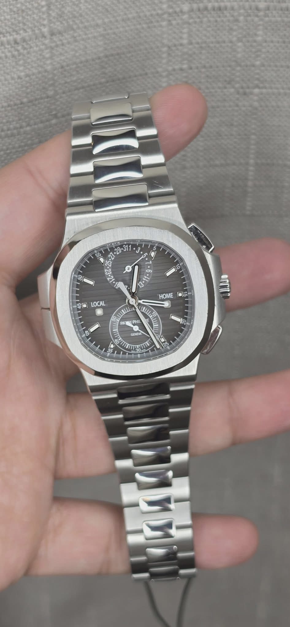 May be an image of wrist watch and text