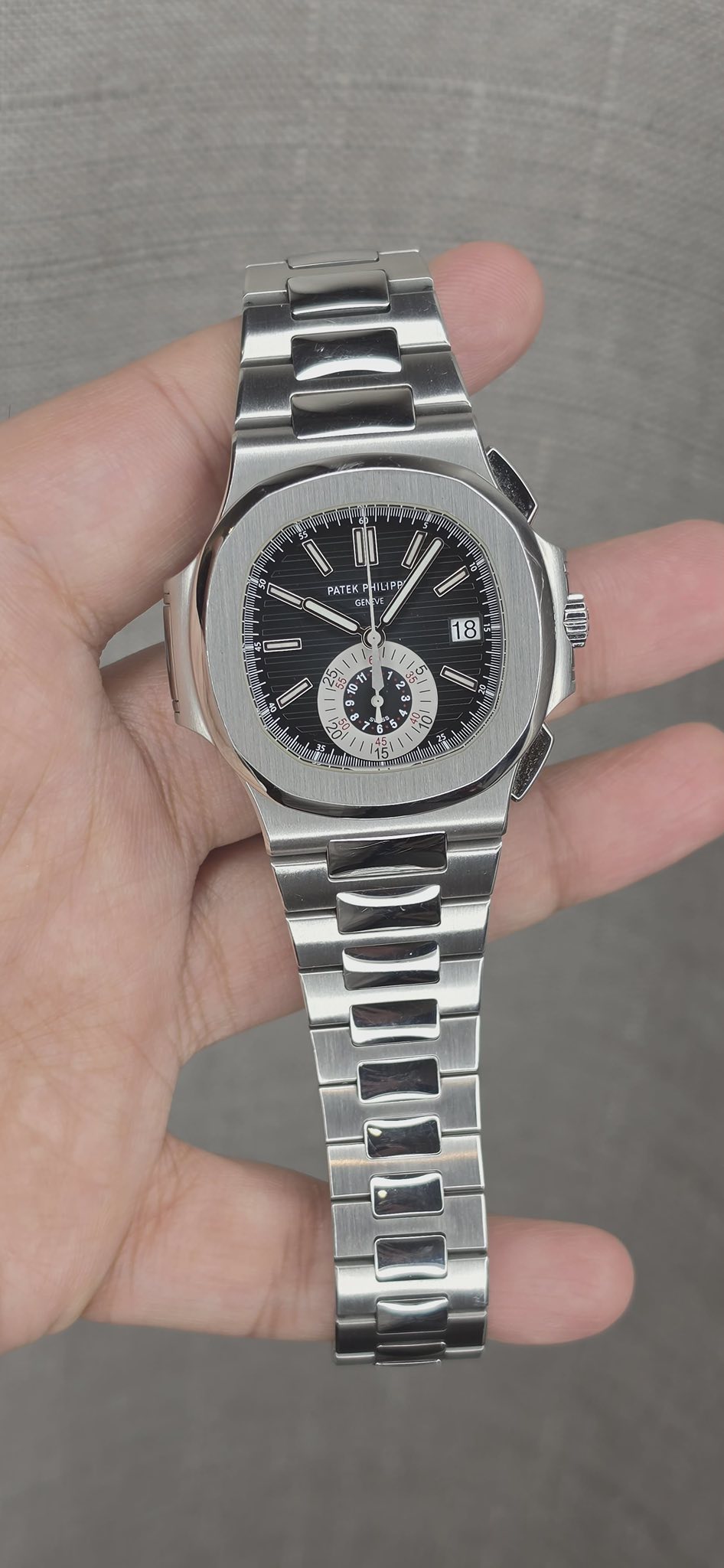 May be an image of wrist watch and text that says 'PATER 18 L 01 / C I 1 HLUI ا0 d T - 193'