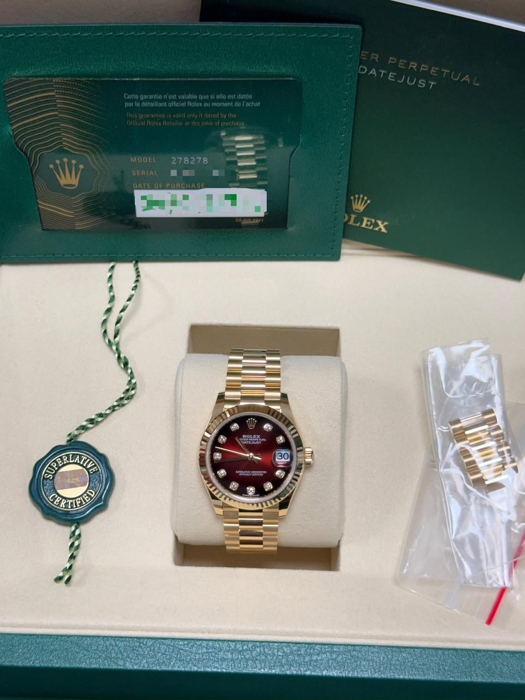 May be an image of wrist watch and text