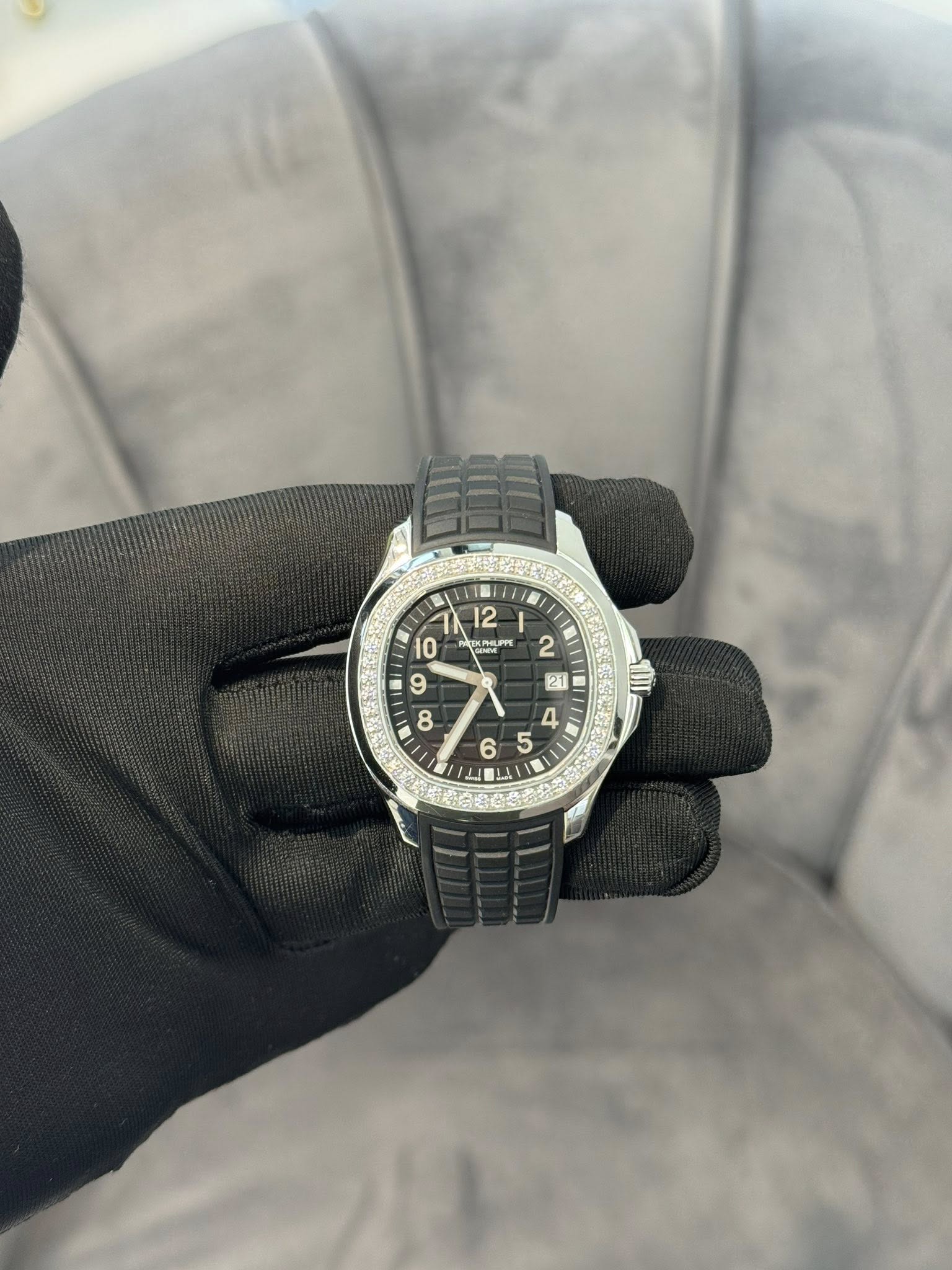 May be an image of wrist watch and text