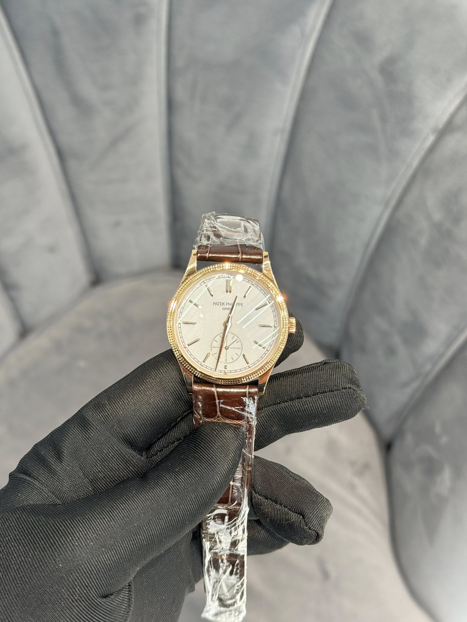 May be an image of wrist watch and text