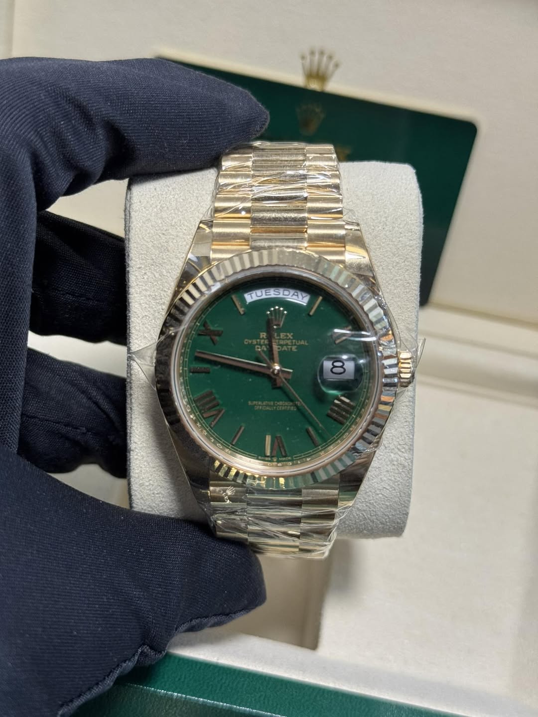 May be an image of wrist watch and text that says 'TUESDAY TUE i'