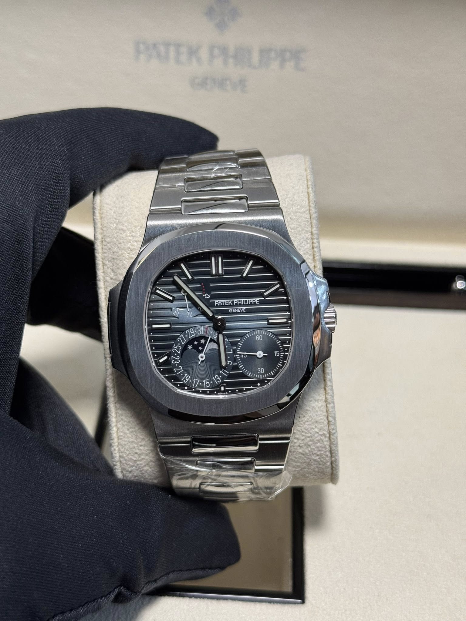 May be an image of wrist watch and text