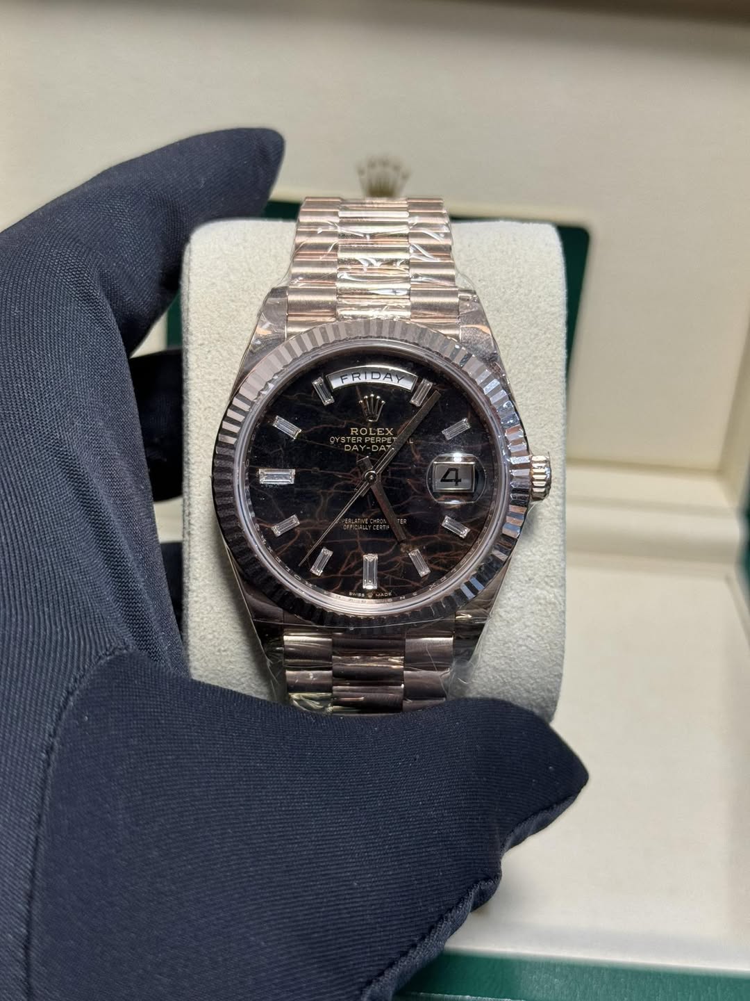 May be an image of wrist watch and text