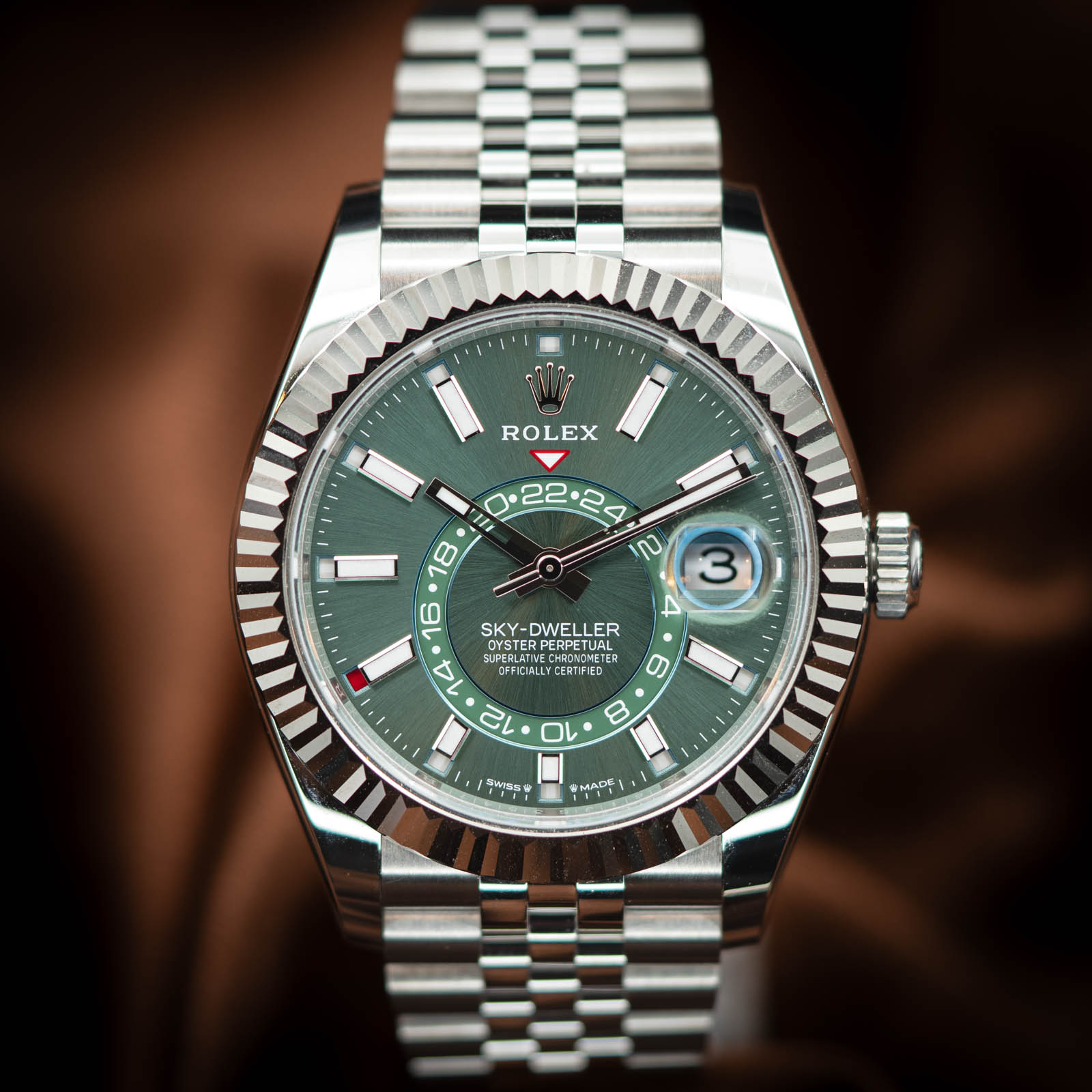 May be an image of wrist watch and text