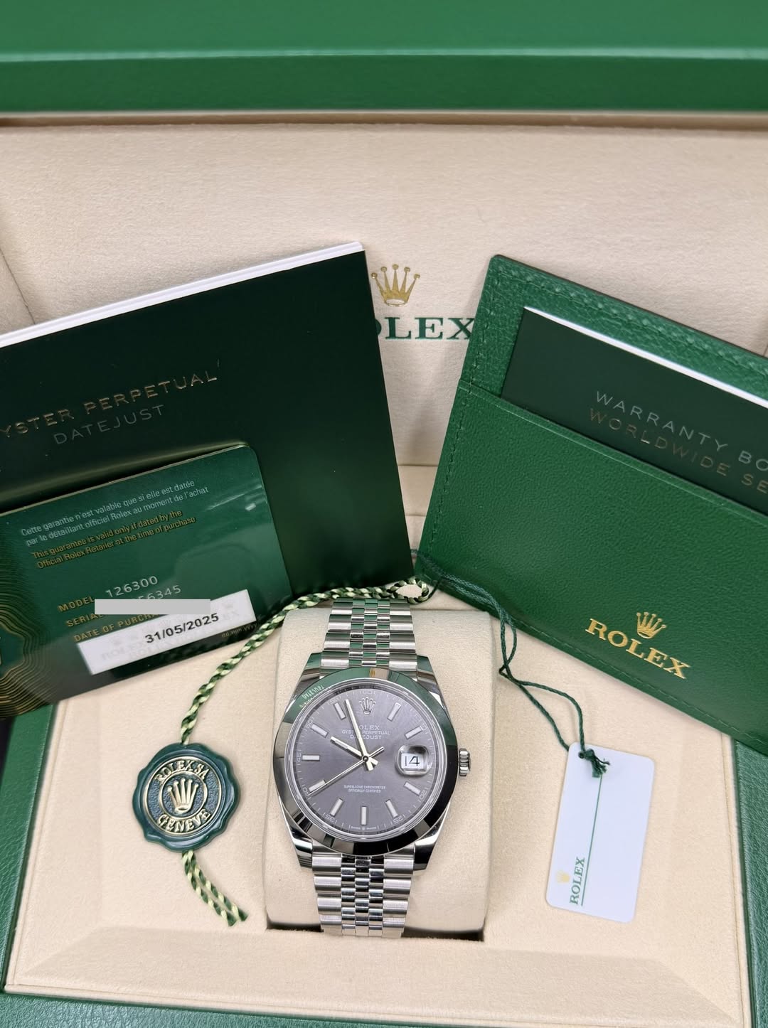 May be an image of wrist watch and text that says 'WW LEX /05/2025 31/05/2025 Wott: / LEF TpA ROLEX ROLEX W 14 LEXSA WV CENEVE ENEY ว អារ ROL ROLEX EX'