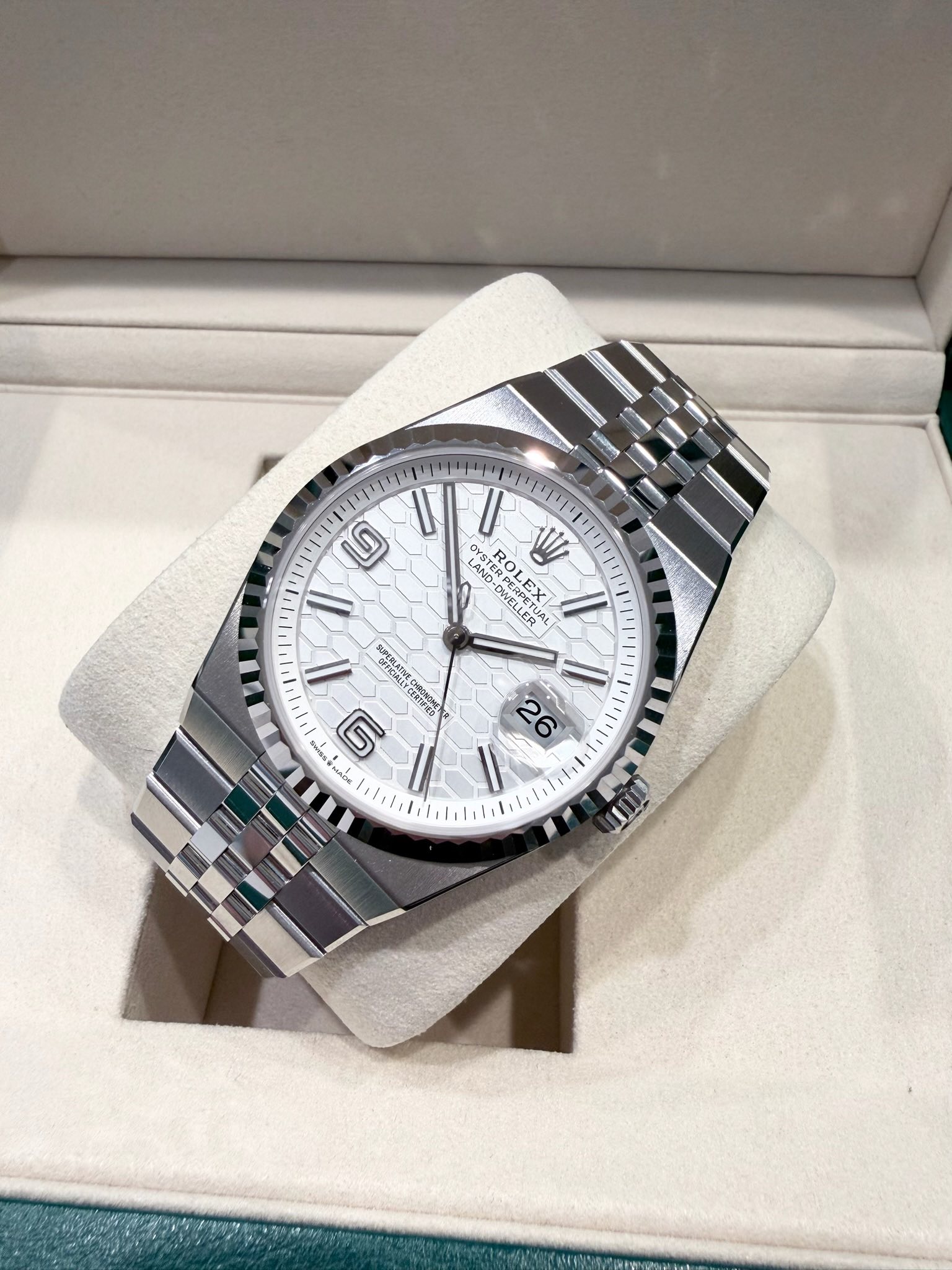 May be an image of wrist watch and text