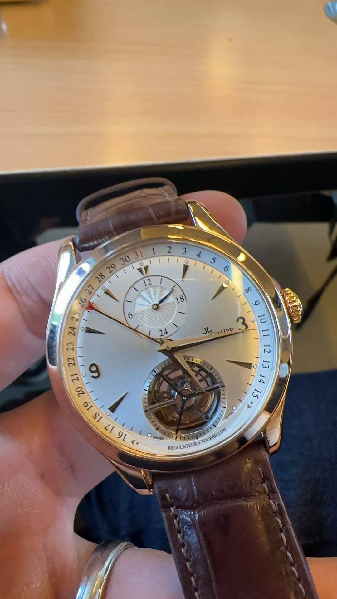 May be an image of wrist watch and text
