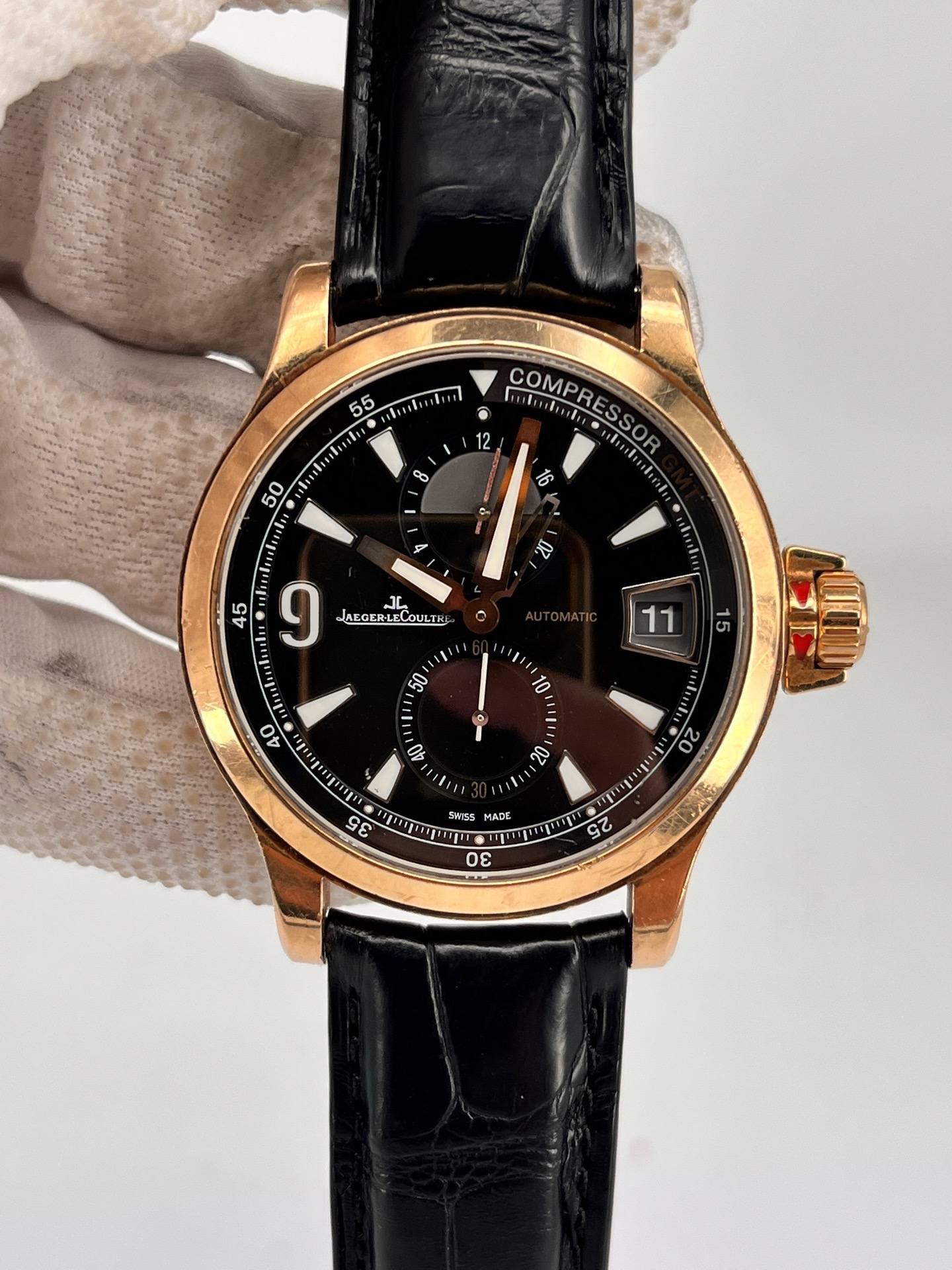May be an image of wrist watch and text