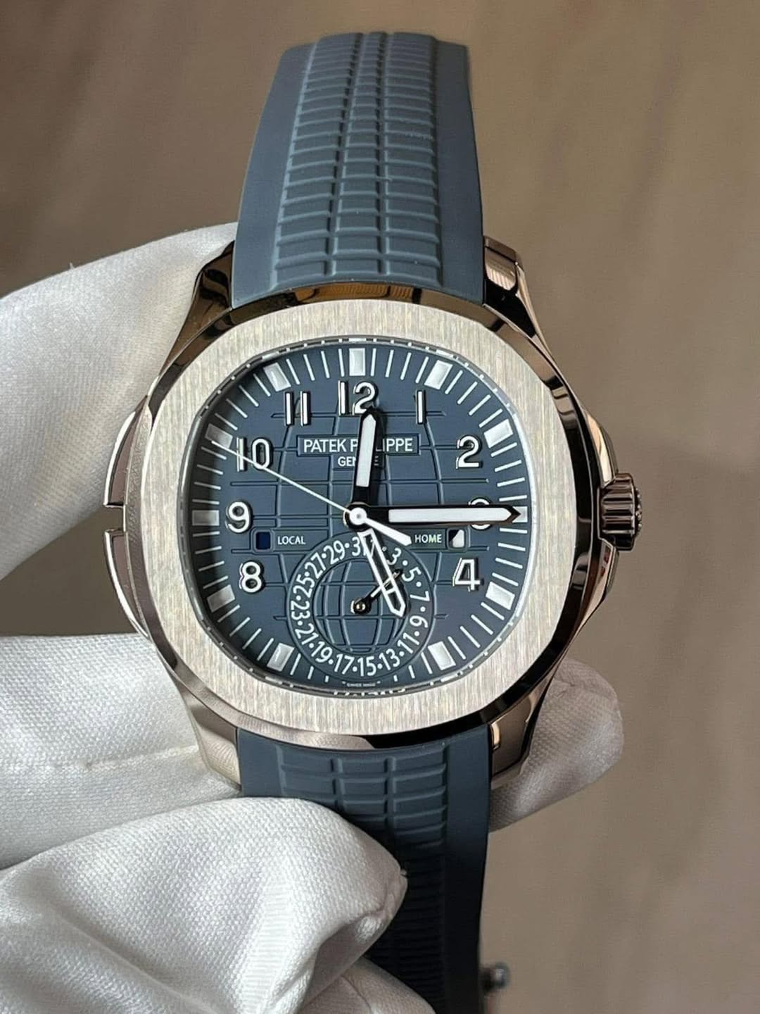 May be an image of wrist watch and text