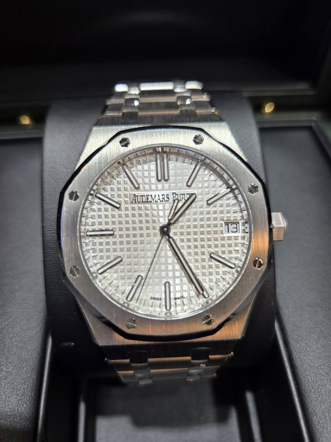 May be an image of wrist watch and text