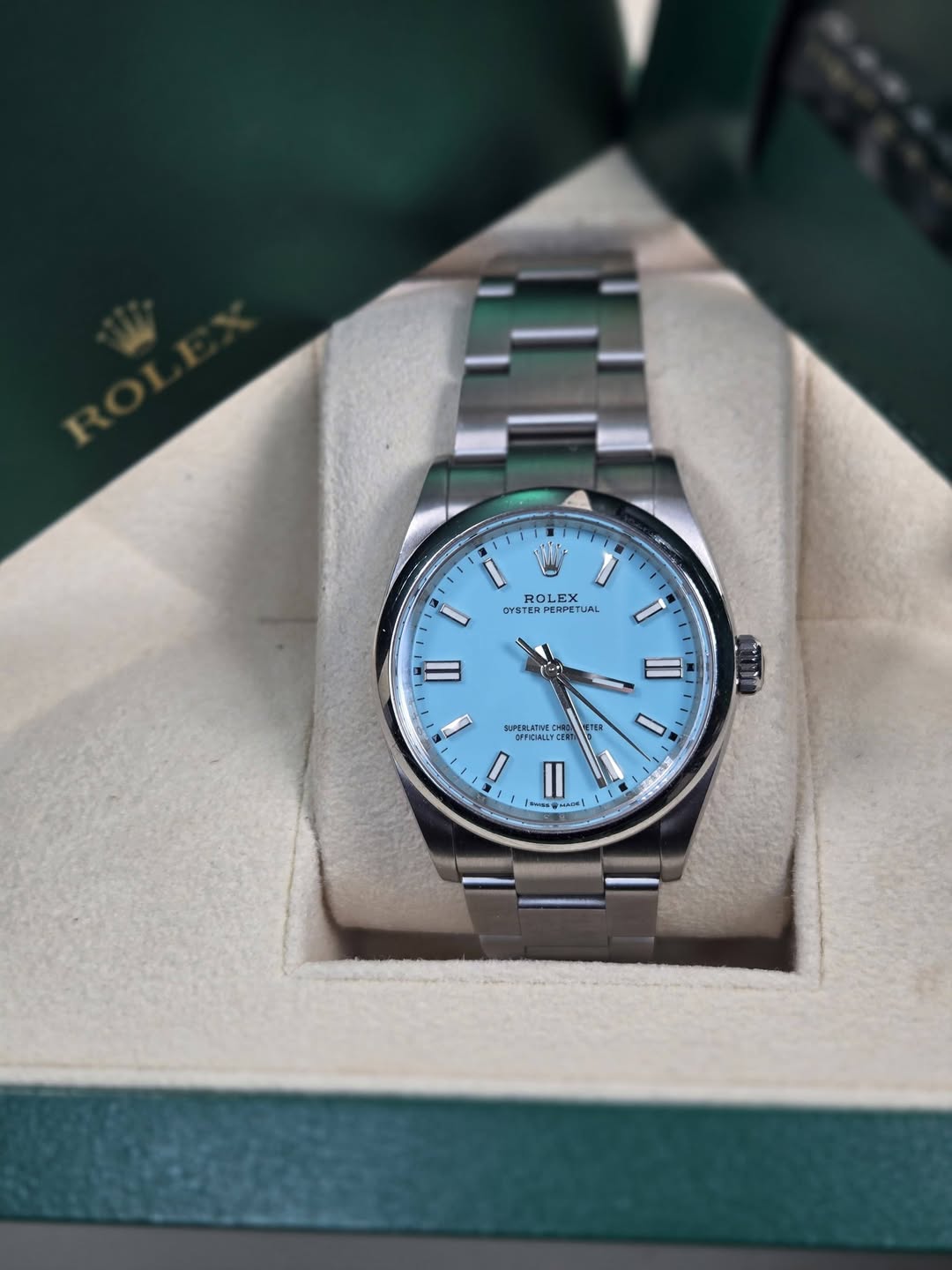 May be an image of wrist watch and text