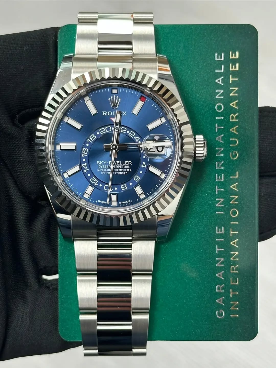 May be an image of wrist watch and text