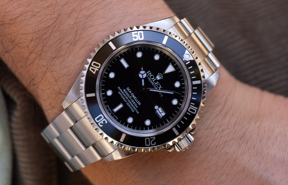 May be an image of wrist watch and text that says '50 40 a ROLEX ELIVECROMOMETER ERLATIVE MO ERLATIV ATIVECHRONOM 5이220m 000ft-1220m SEA-DWELLER SE SEA-D TIVECHRO HRONOM ROMO…