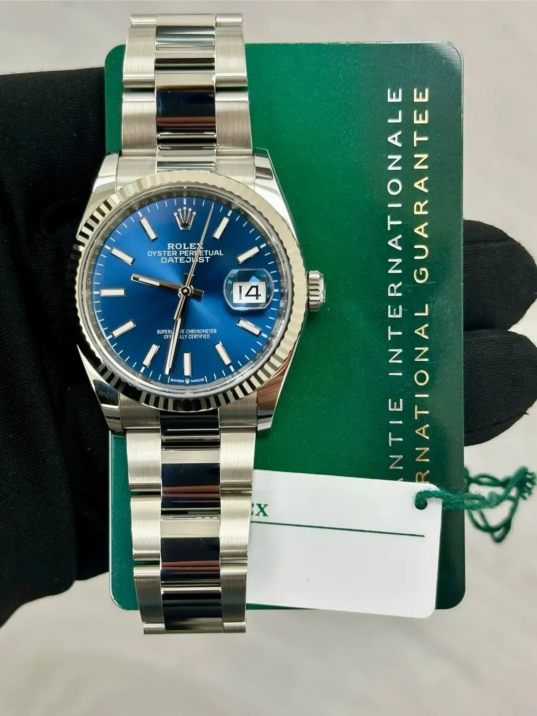May be an image of wrist watch, timer and text that says 'ROLE OYS STER EDERDETUA RUET TUAL DAT DATEJUST טבש PERE EJU 14 SUPERL CHRONOMLTE TER CEROFIE SWWG LUAt MRDH . CI…
