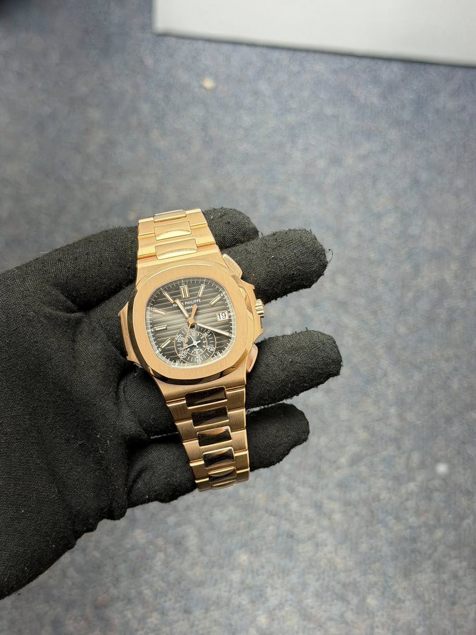 May be an image of wrist watch and text