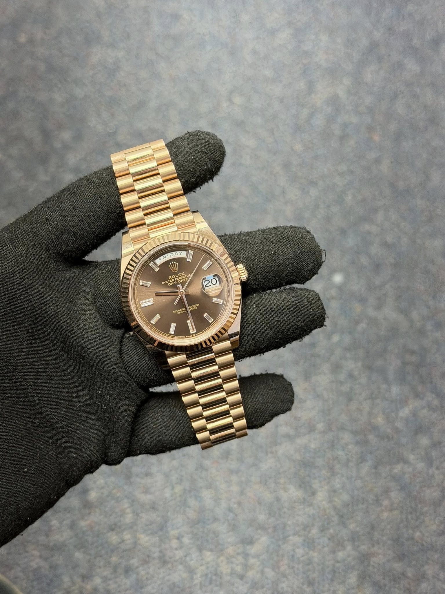 May be an image of wrist watch and text