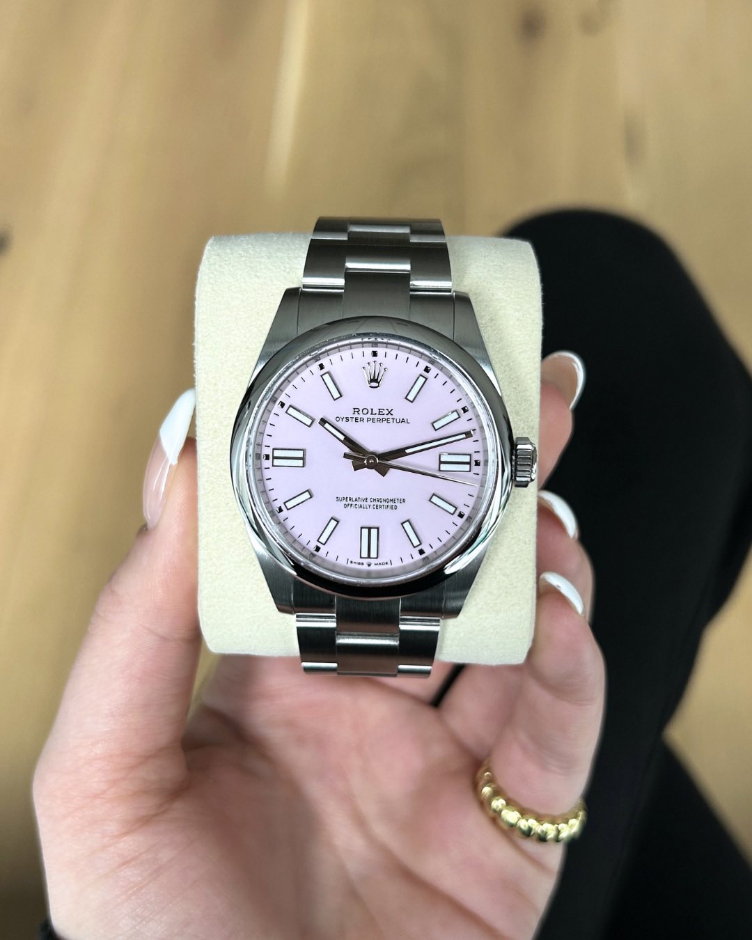 May be an image of wrist watch