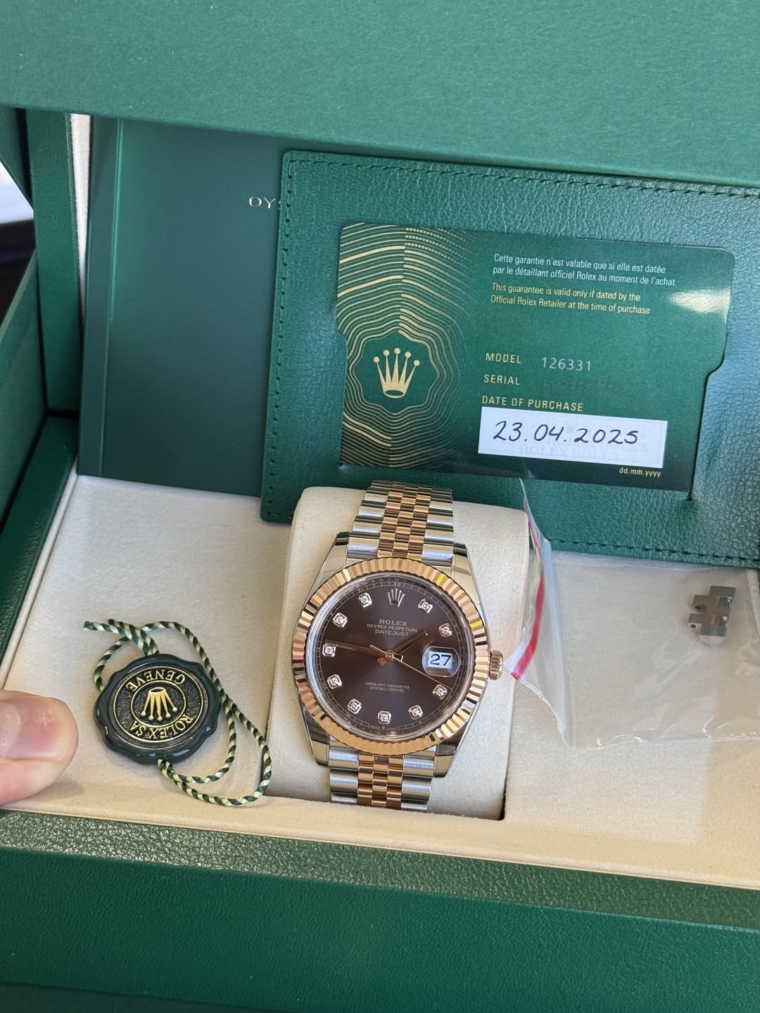 May be an image of wrist watch and text