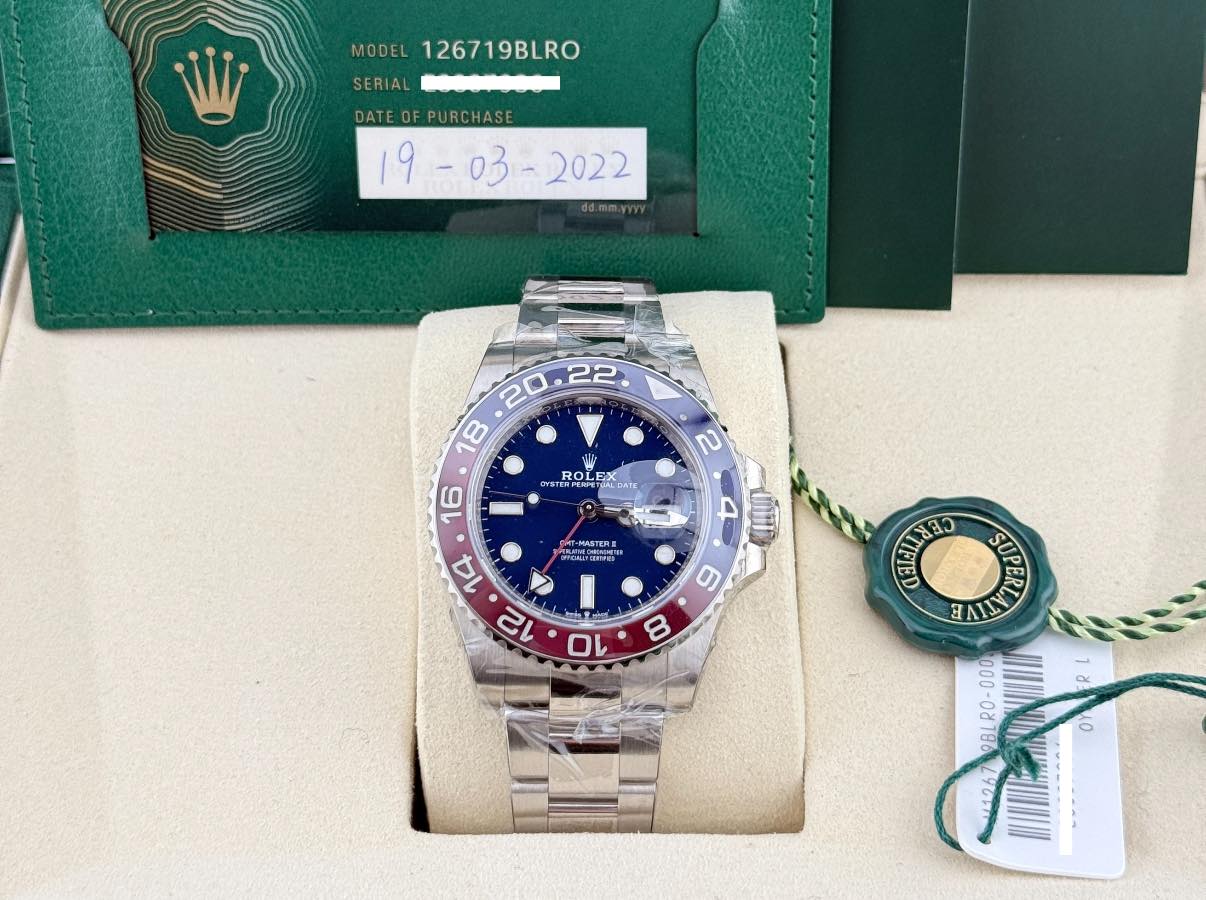 May be an image of wrist watch and text that says 'MODEL SERIAL 126719BLRO DATE ATEOFPURCHASE τοι LEX OLEX EA DATE 2 0 -MASTENE EmOAU MONI 4 UUE OfeIda Cblx SUPERL 別 SUP لی ম…