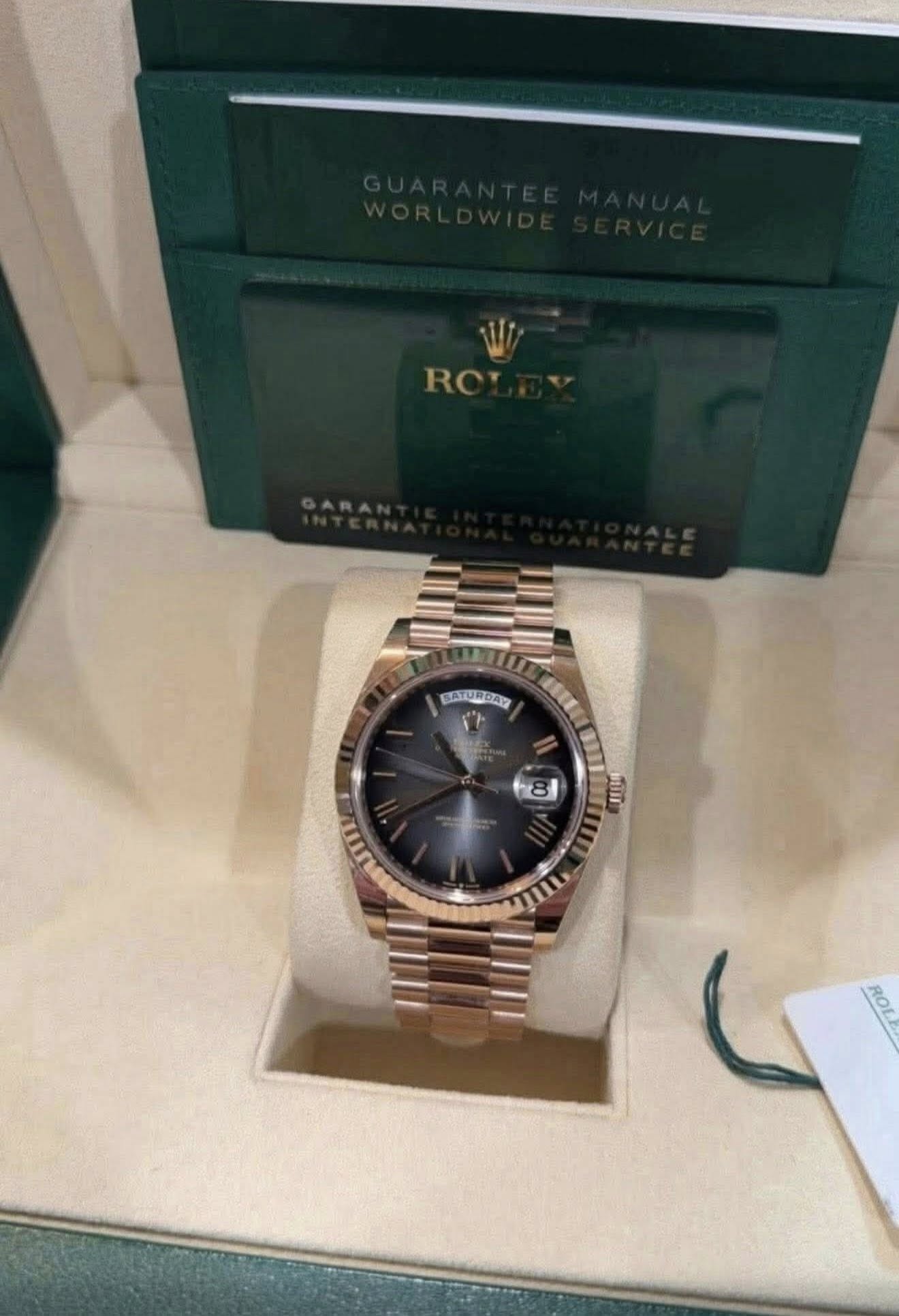 May be an image of wrist watch and text