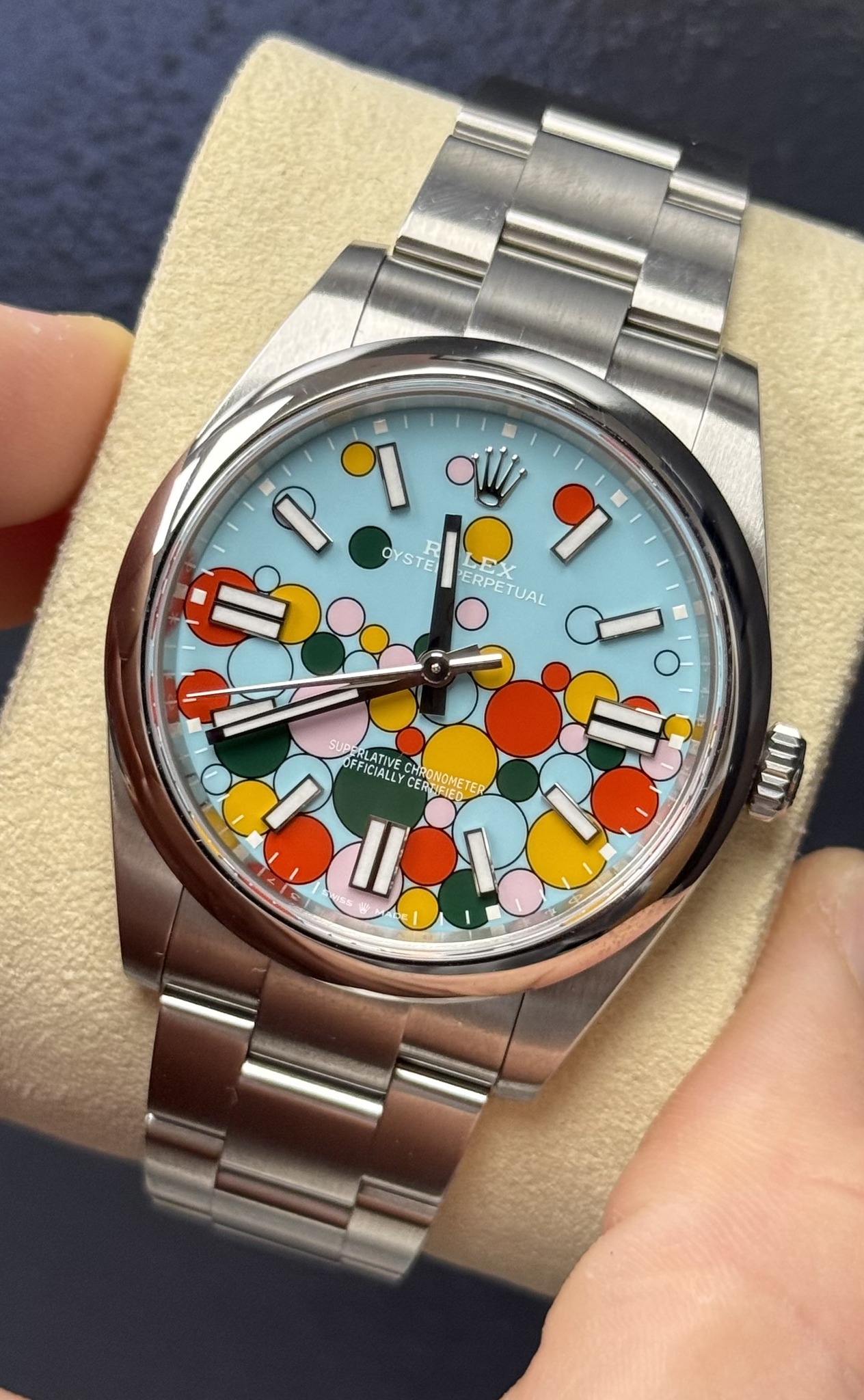 May be an image of wrist watch and text