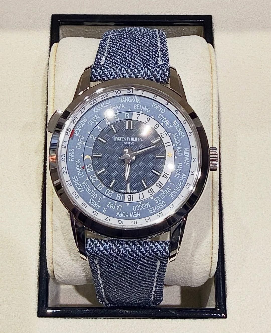 May be an image of digital watch and text that says 'PATE PHILIPPE GENEVE 28 KARACHI OHAKA BEIJING TOKYO 3 BANGKOK 27 20 DUBAI 5 G 9 9 SYDNEY CAIRO WILH PARIS AUCKLAND NOUMEA G…
