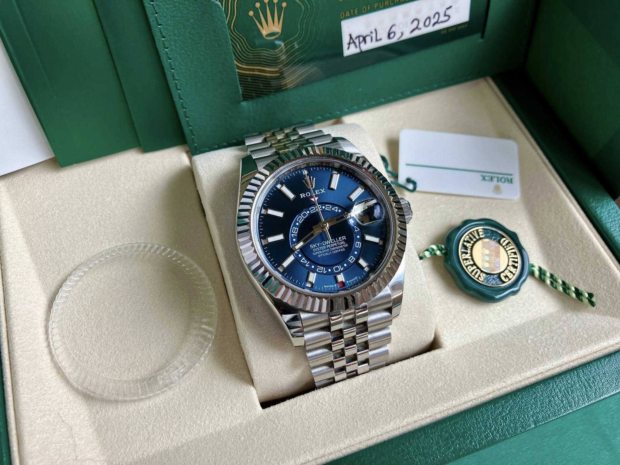 May be an image of wrist watch and text