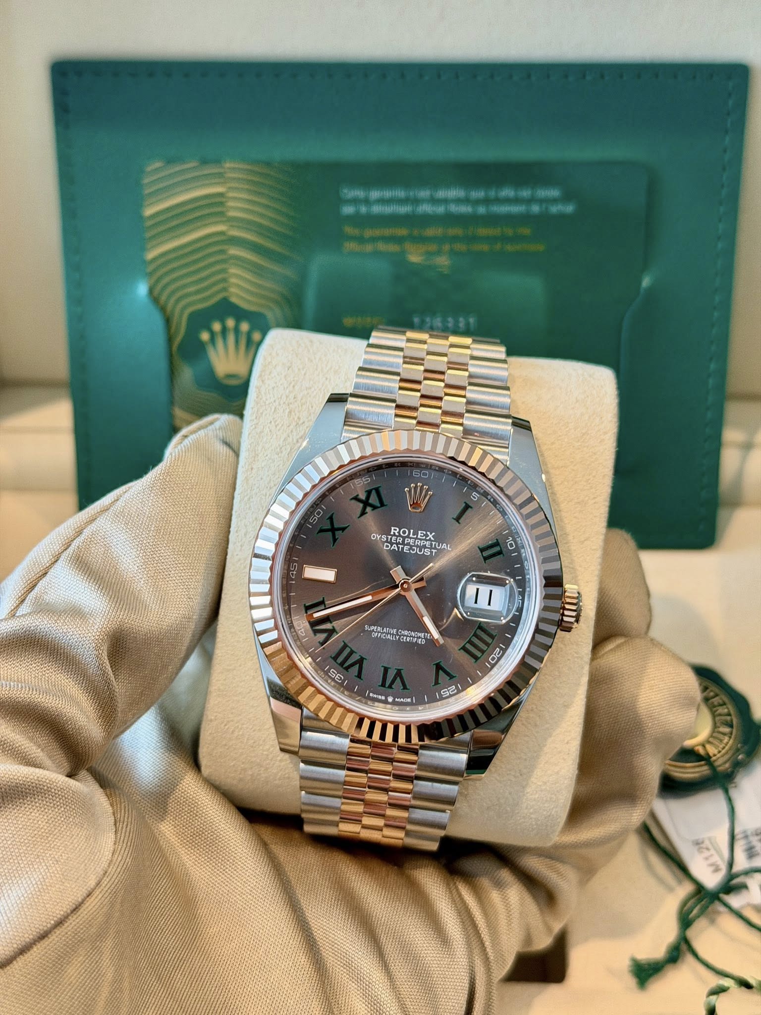 May be an image of wrist watch and text