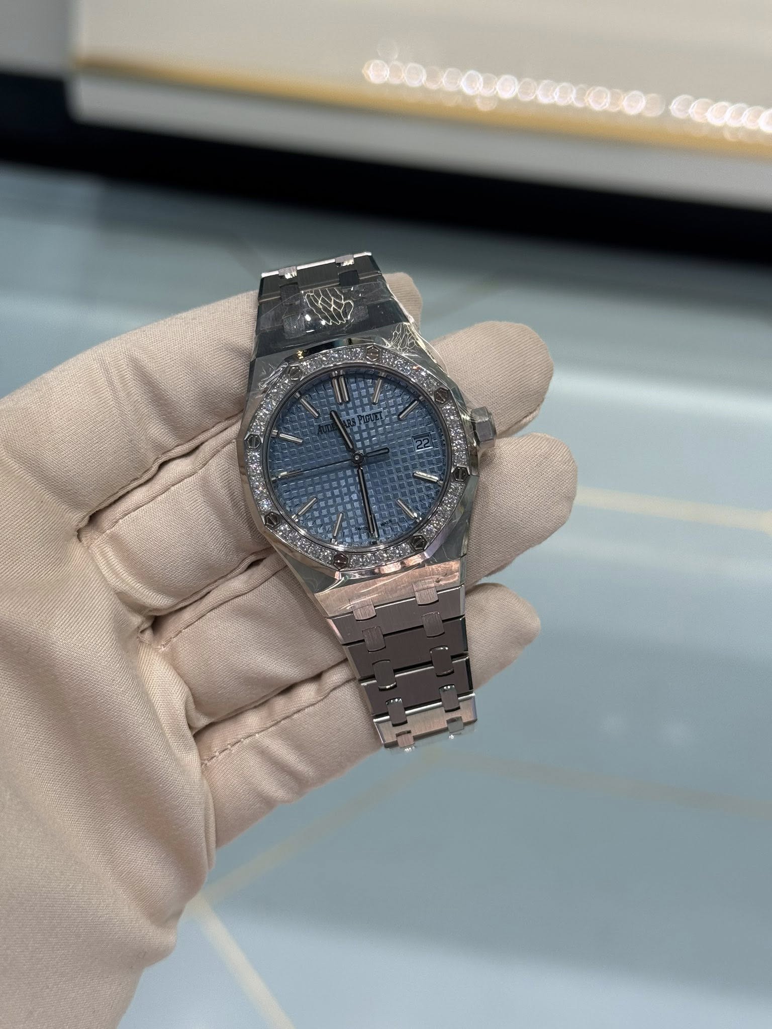 May be an image of wrist watch and text